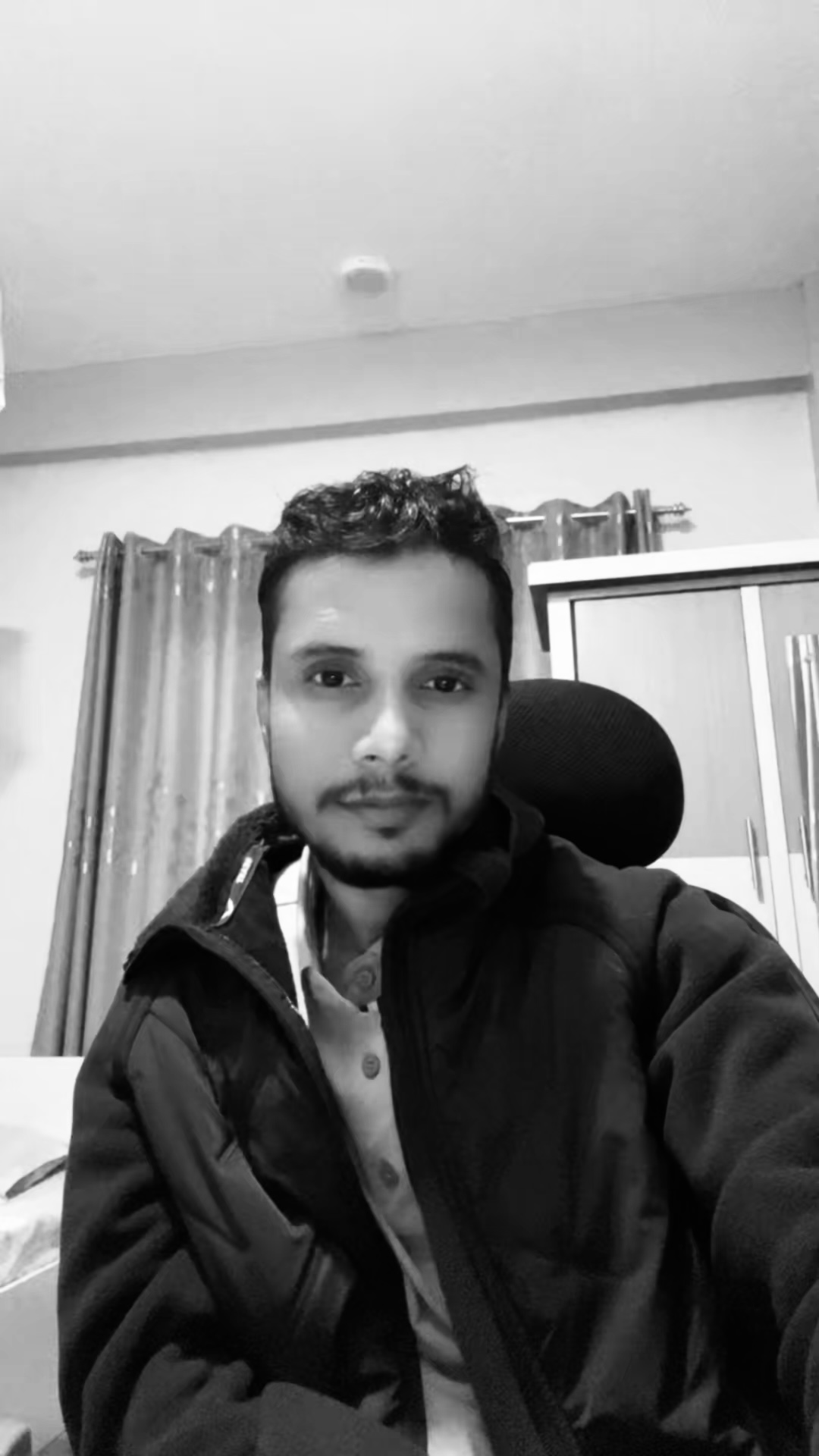 A professional portrait of Bishal Pokhrel