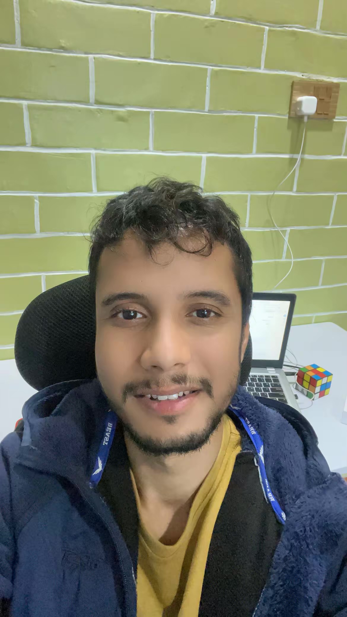 A professional portrait of Bishal Pokhrel